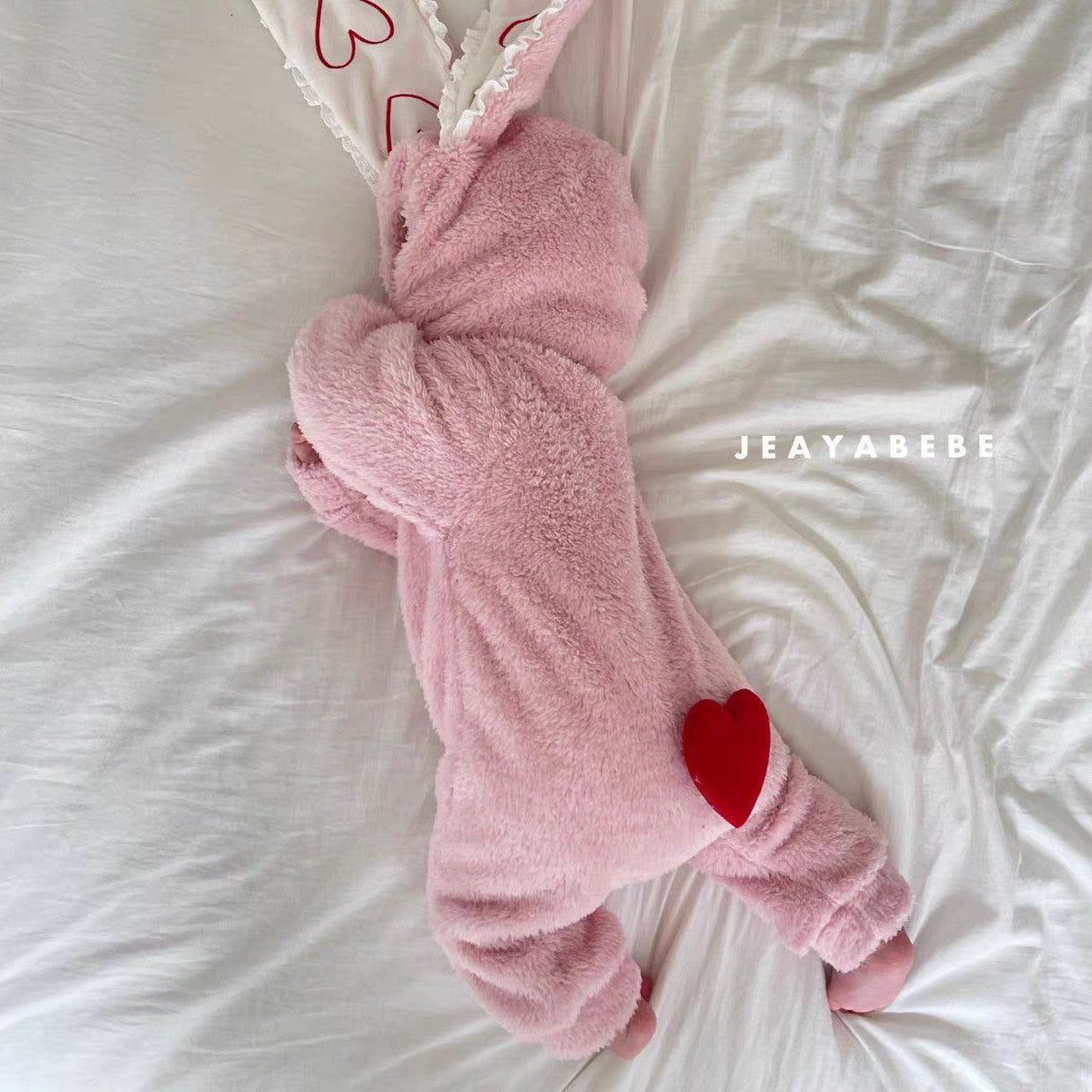 Fluffy hooded bunny baby romper with long heart-patterned ears and front zip – view 4 of 9