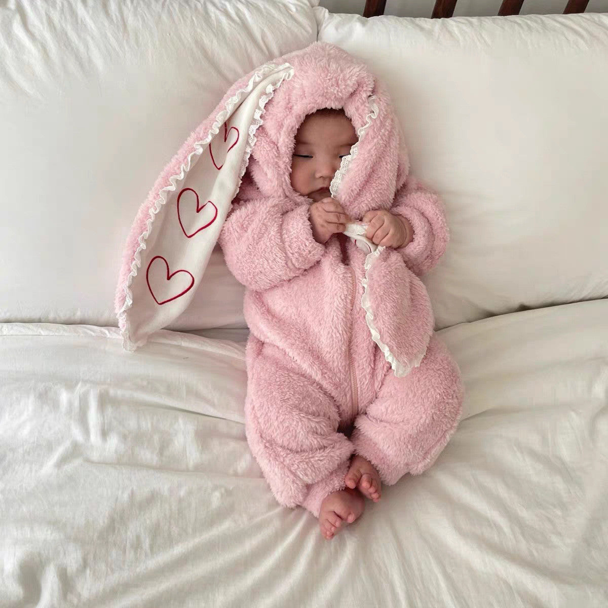 Fluffy hooded bunny baby romper with long heart-patterned ears and front zip – view 3 of 9