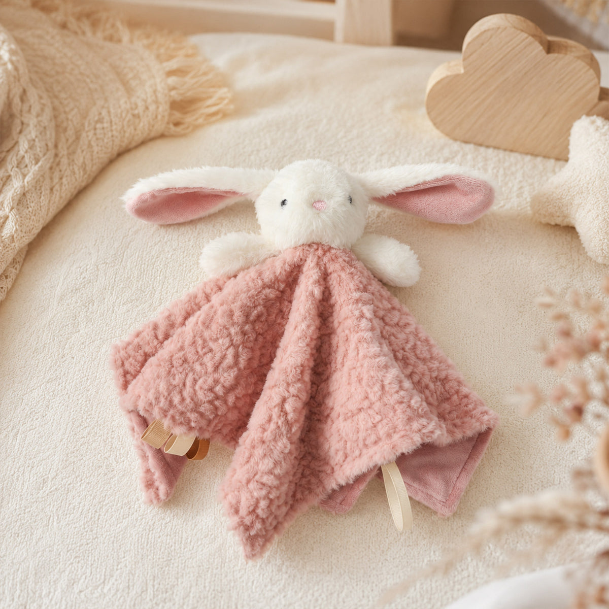 Bunny and Bear Baby Comforter, Soft Plush, held in hand for scale