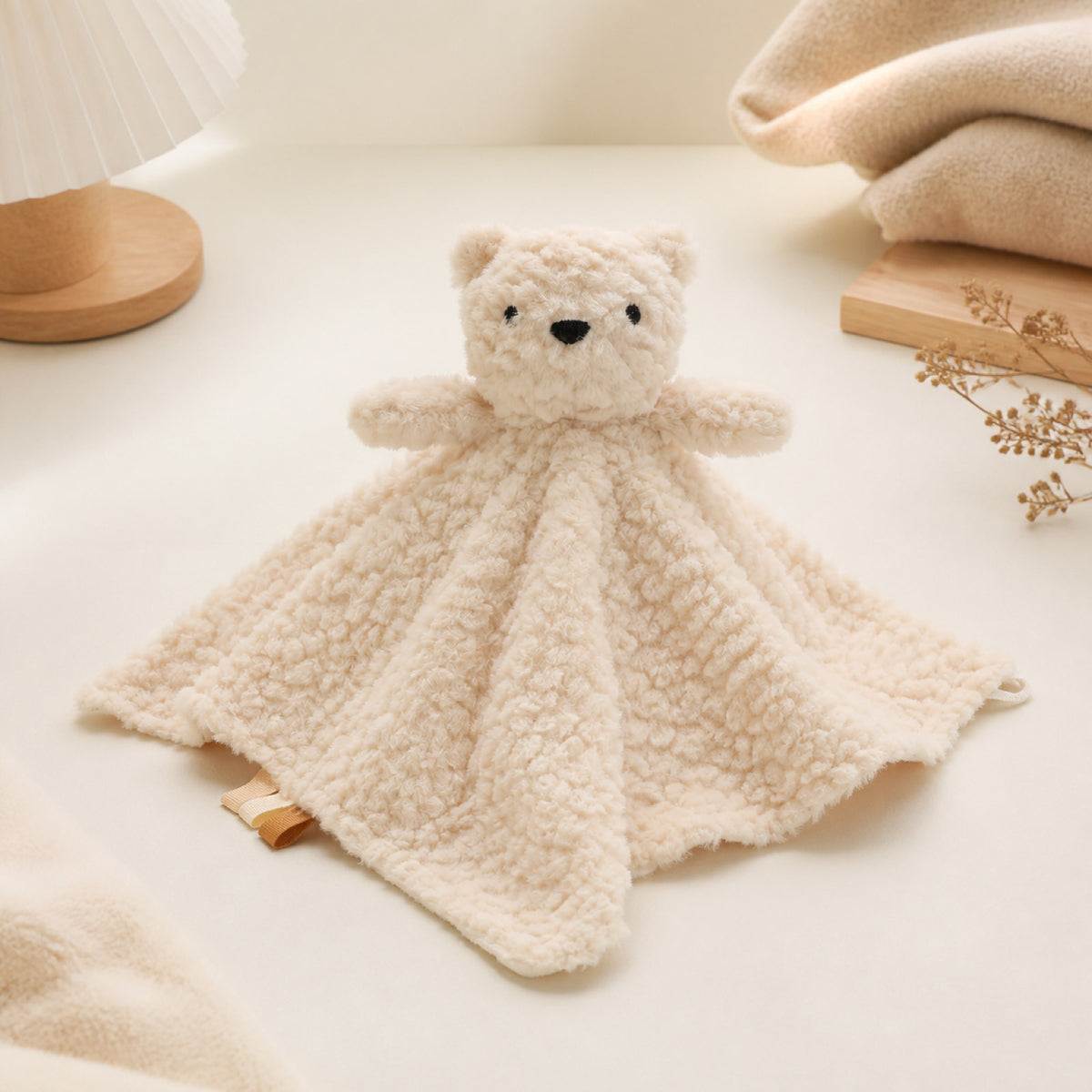 Bunny and Bear Baby Comforter, Soft Plush, styled on a shelf