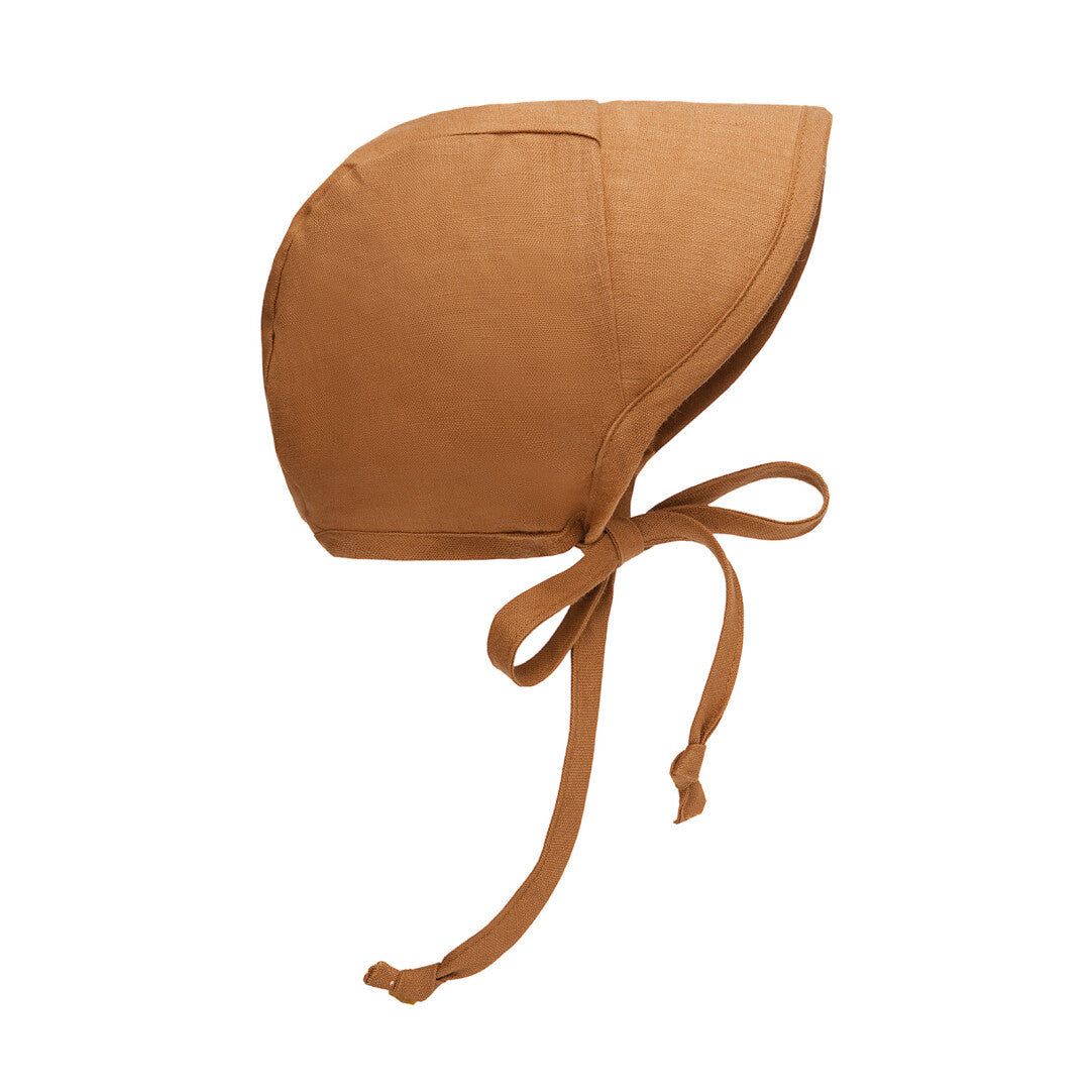 Rust baby bonnet with short brim and chin ties