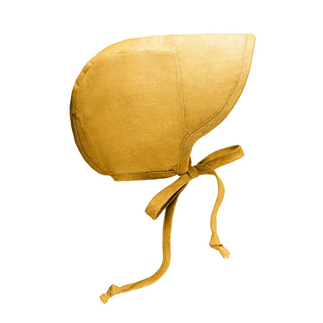 Mustard baby bonnet with short brim and chin ties