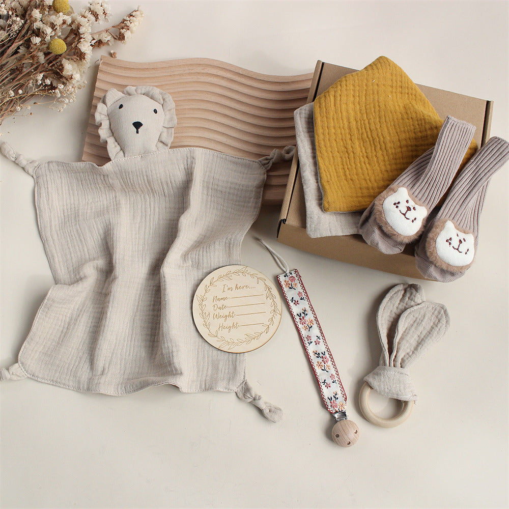 Khaki Lion boxed newborn gift set with comforter, bib and socks