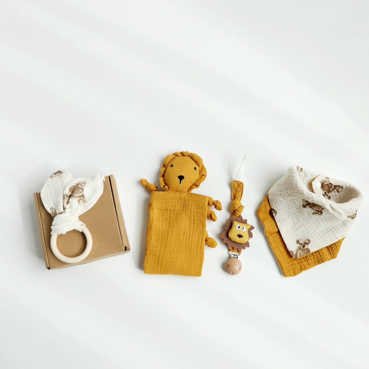 Mustard Lion boxed newborn gift set with comforter and bandana bib