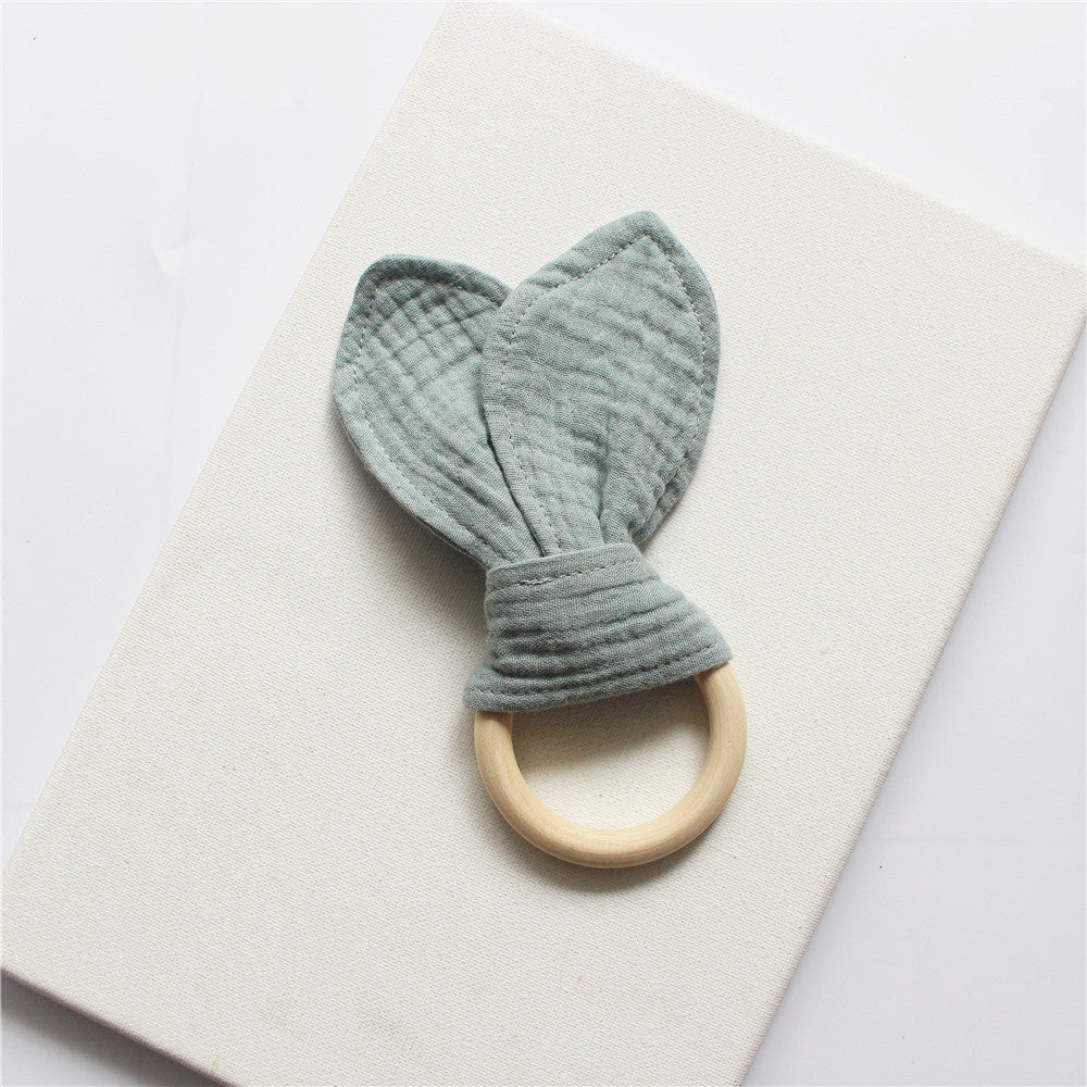 Pea Green wooden teething ring with cotton gauze bunny ears