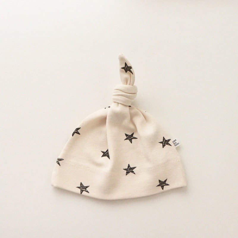 Apricot Star print knotted baby hat in cotton