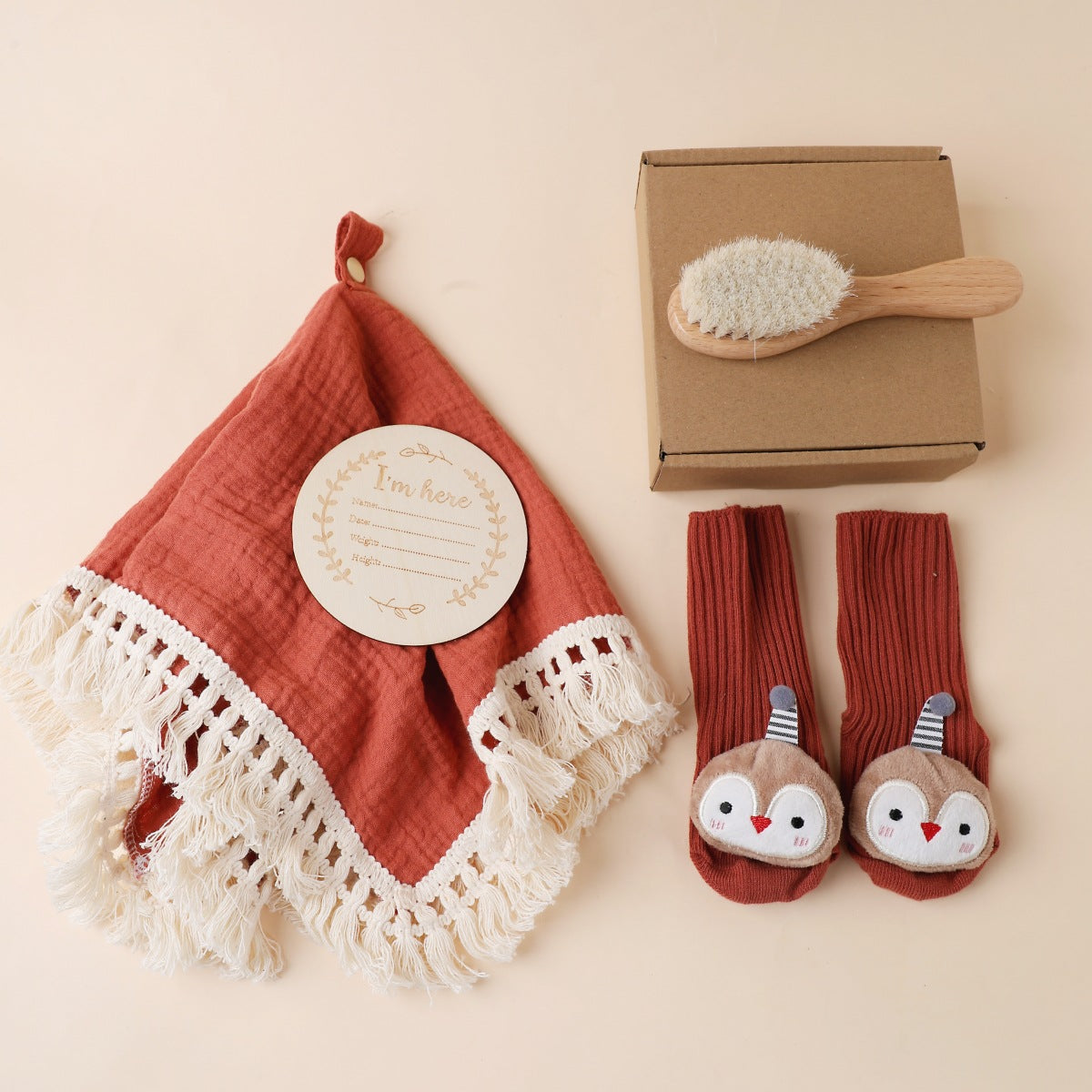 Brick Red boxed newborn gift set with tassel comforter, socks and brush