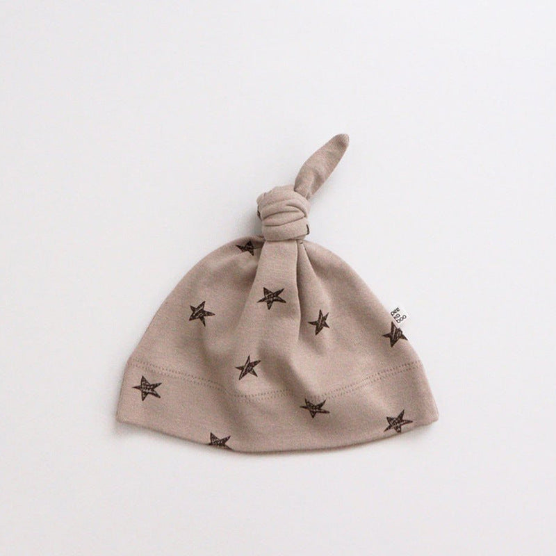 Khaki Star print knotted baby hat in cotton