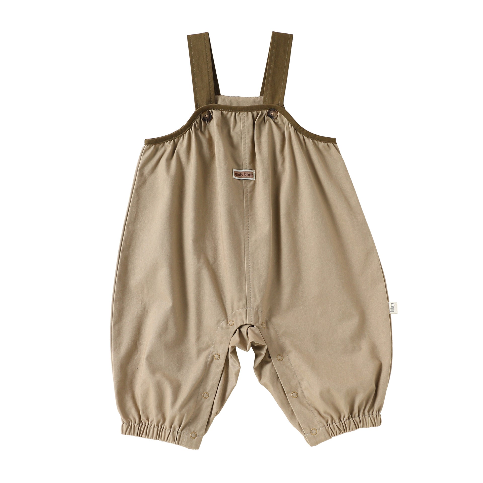 Light Khaki cotton baby dungarees with adjustable straps, flat lay