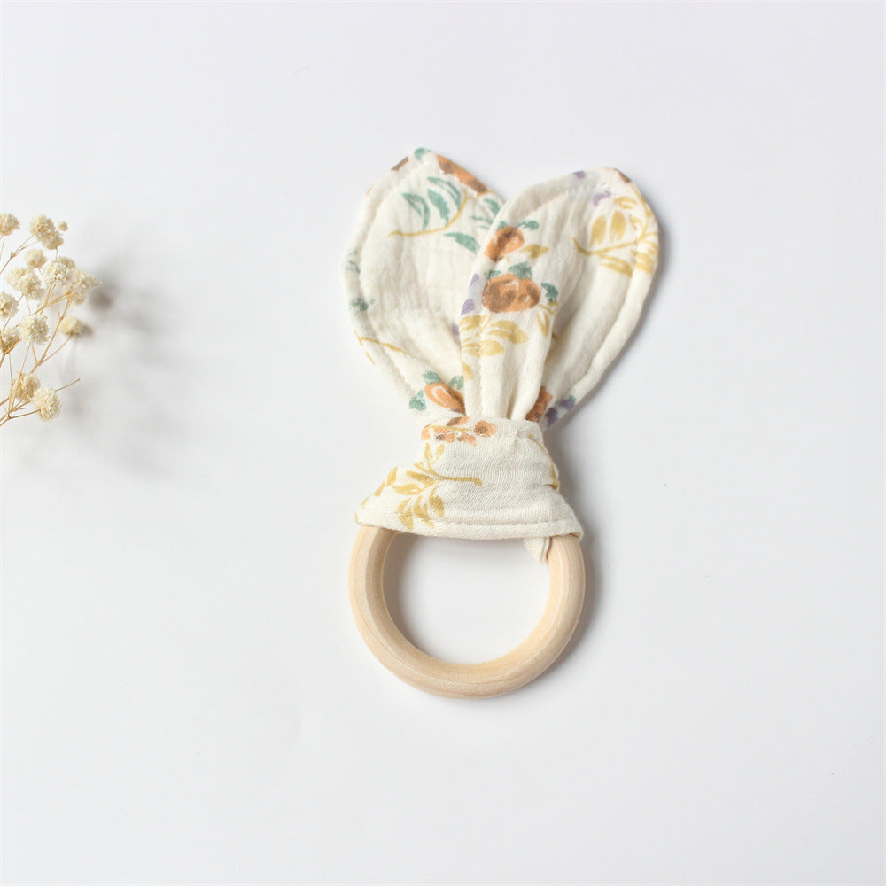 Blossom wooden teething ring with cotton gauze bunny ears