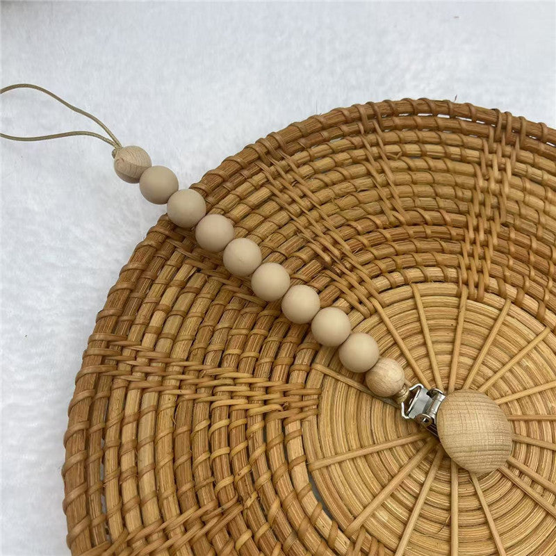 Khaki silicone and beech beaded dummy clip
