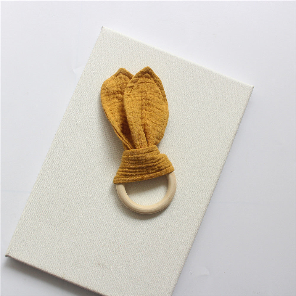 Mustard wooden teething ring with cotton gauze bunny ears