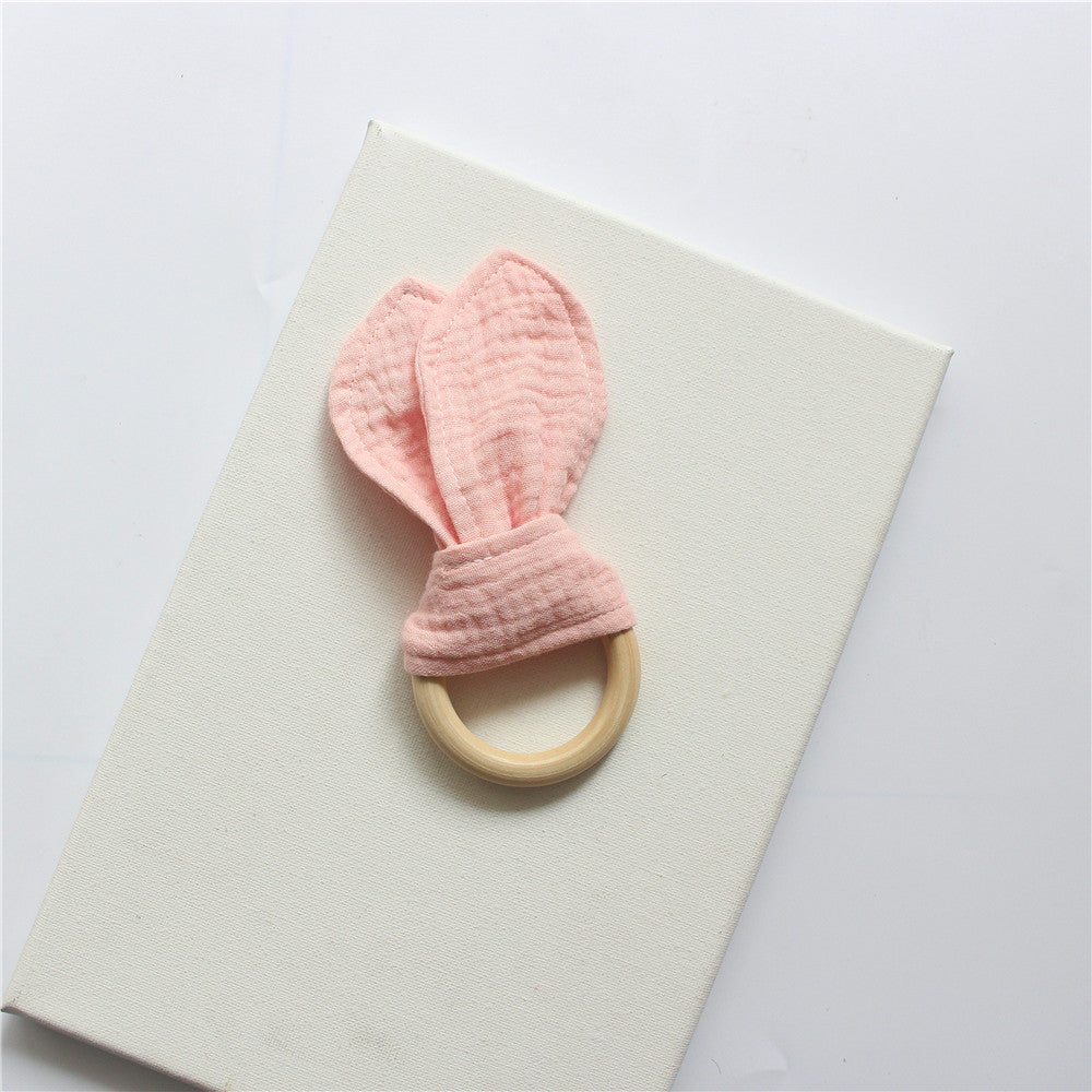 Blush Pink wooden teething ring with cotton gauze bunny ears