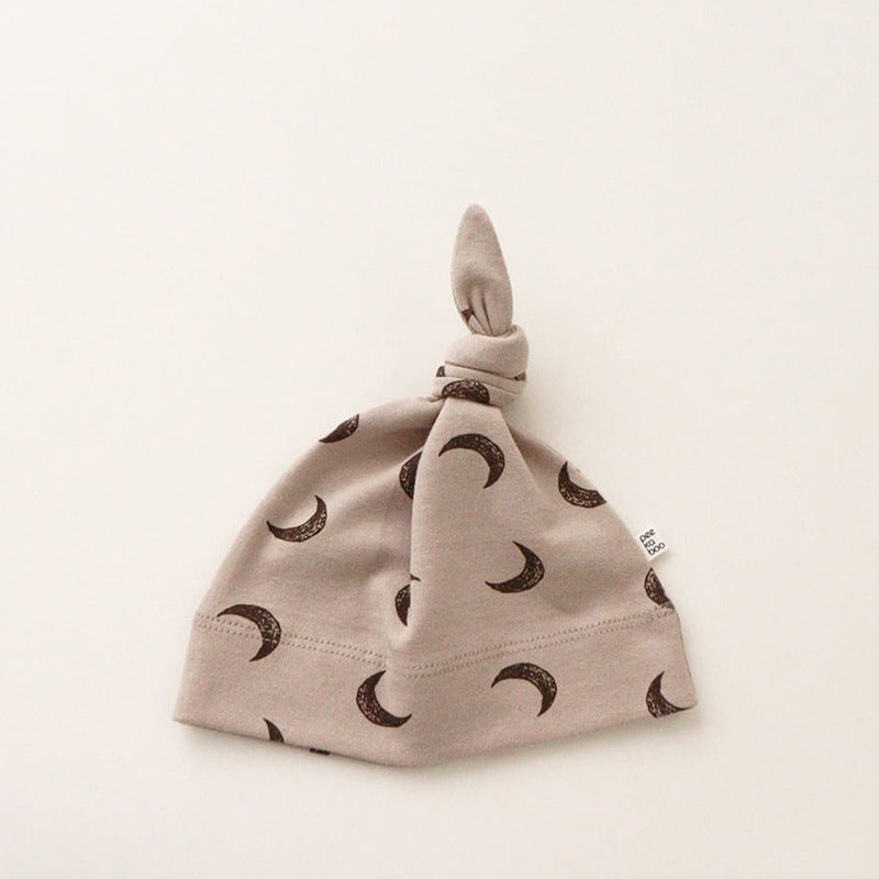 Khaki Moon print knotted baby hat in cotton