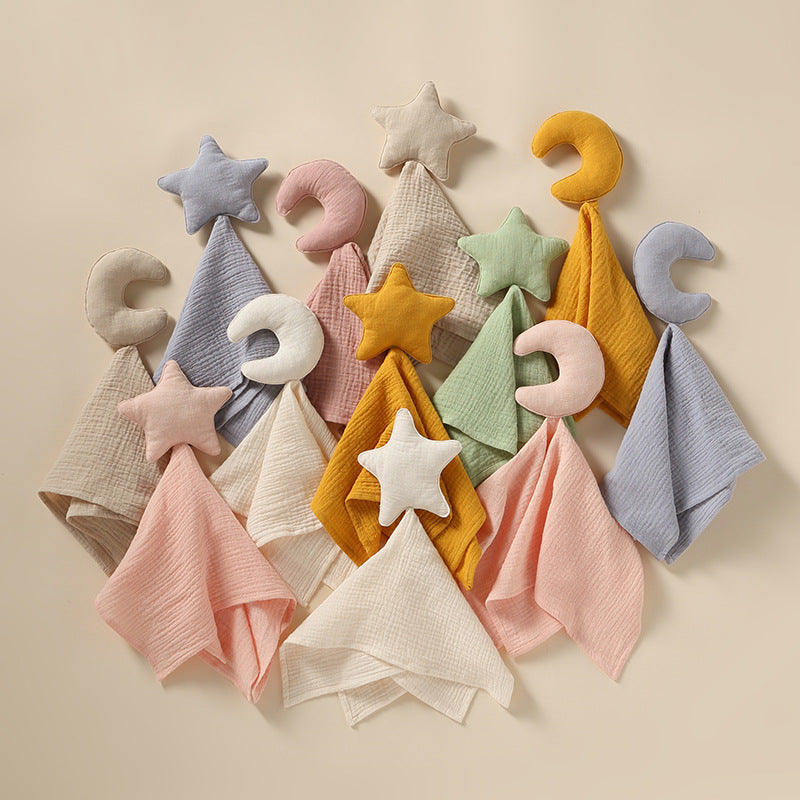 Crinkled gauze baby comforter square with a padded star hand puppet