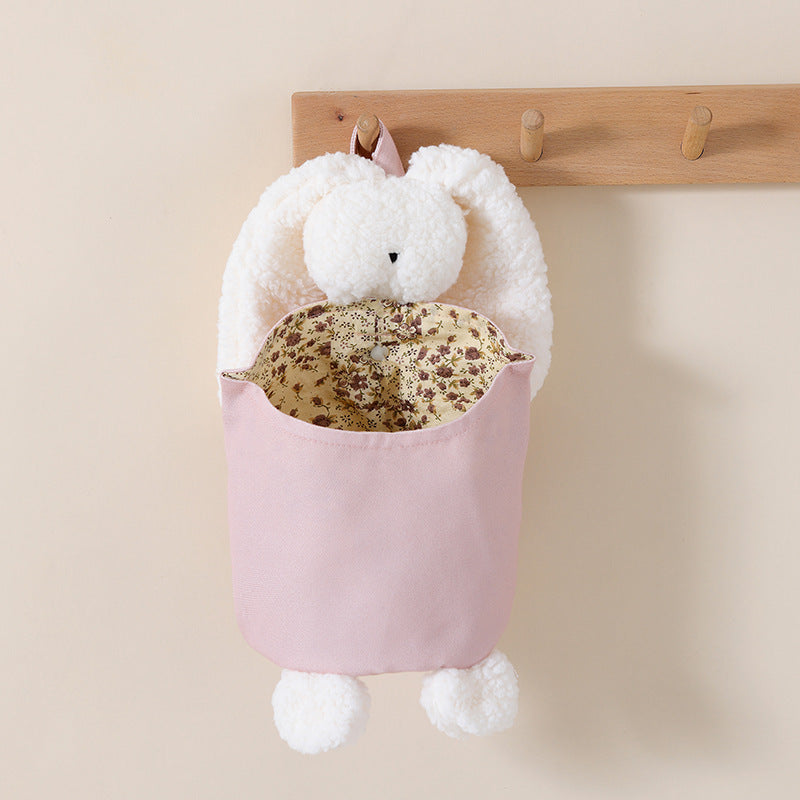 Pink hanging bunny nursery organiser for nappies and bottles