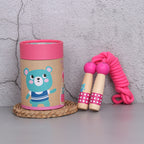 Bear wooden skipping rope with beech handles, shown with its kraft gift tube