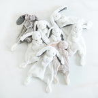 Baby comforter with plush bunny, bear or puppy head on a small comforter blanket