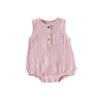 Pink sleeveless cotton baby bodysuit, flat lay