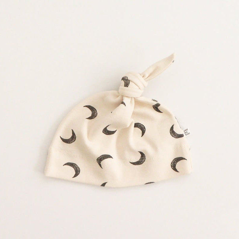 Apricot Moon print knotted baby hat in cotton