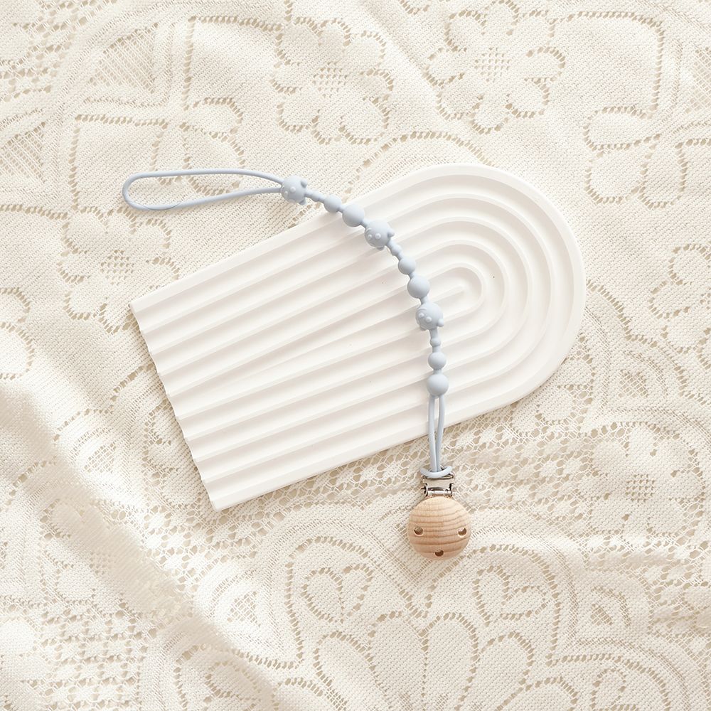 Silicone Dummy Clip, Beaded Soother Holder with Beech Wood Clip & Bear, Face Beads, 22 cm, 7 Colours, held in hand for scale