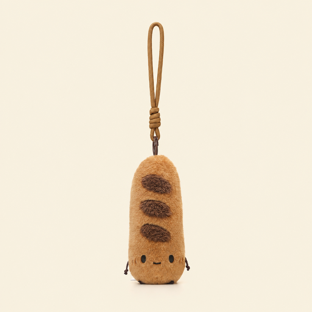 Small short-plush bakery treat soft toy shaped like bread – view 10 of 10