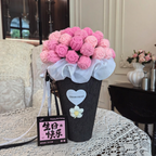 Pink decorative flower bouquet in keepsake tub with blanket and greeting card – view 7 of 9