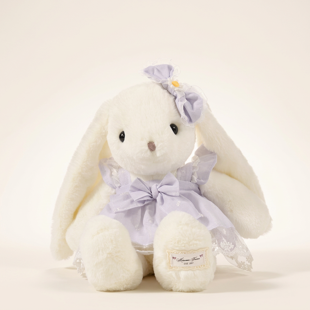 Long-eared cream bunny soft toy in a pastel dress with large bow and daisy ear accent – Purple, 40cm