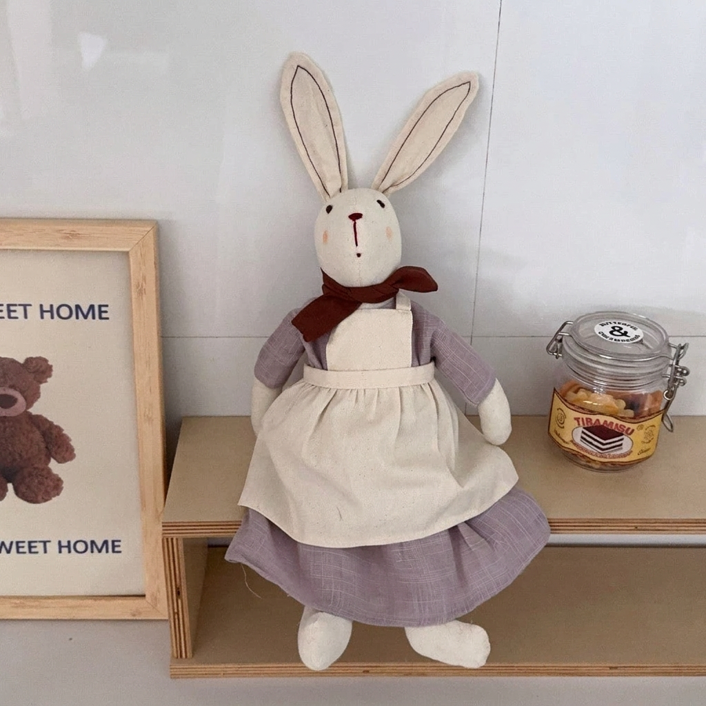 Fabric bunny doll with long ears, red neck bow, dress and apron – view 7 of 9