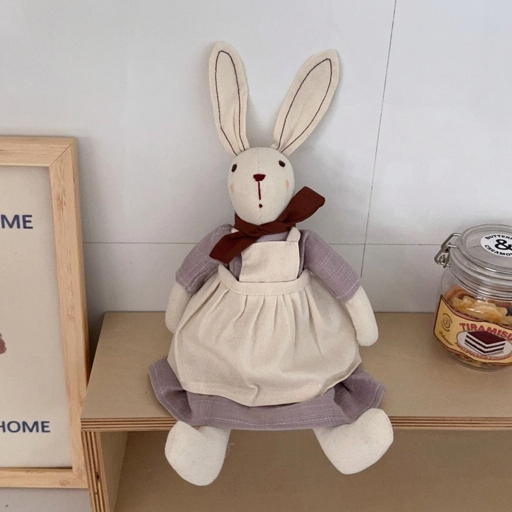 Fabric bunny doll with long ears, red neck bow, dress and apron – view 6 of 9