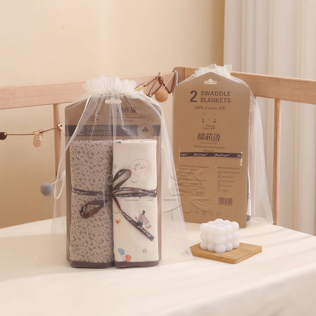 Two square printed baby wrap blankets with bound edges – view 8 of 14