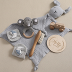 Baby milestone gift box with bunny comforter, crochet ring toy, socks and brush – view 13 of 15