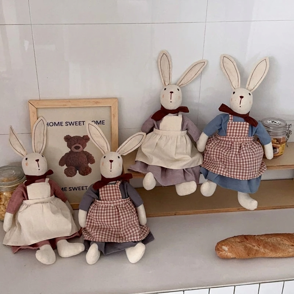 Fabric bunny doll with long ears, red neck bow, dress and apron – view 4 of 9