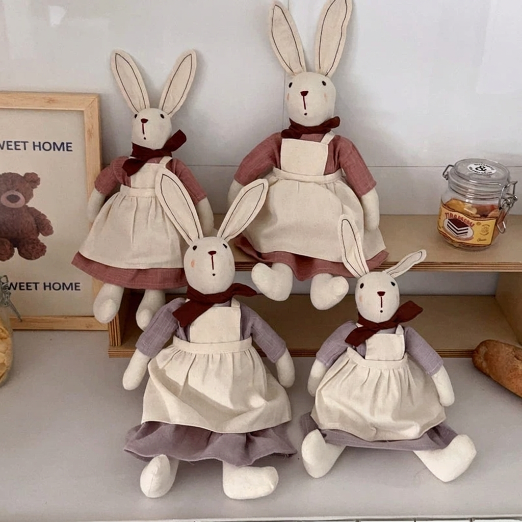 Fabric bunny doll with long ears, red neck bow, dress and apron – view 3 of 9