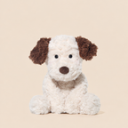 Soft plush puppy soft toy, 35 cm long, lying on a bed – view 3 of 4