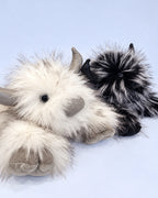 Frost White and Smoky Black Highland cow plush toys together